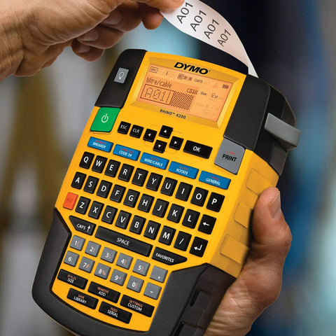 Person using Rhino 4200 Industrial Label Maker With Fast Printing One Touch Hot Keys Rugged Build For Tough Job Sites