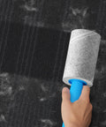 Using Extra Sticky Lint Roller Mega Value Set with 400 Sheets for pet hair removal on carpet, highlighting easy tear diagonal peel design.