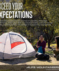 Two campers beside a tent with trees in background, featuring a Large Zippered Tent Bag For Camping Gear With Easy Carry Strap visible.