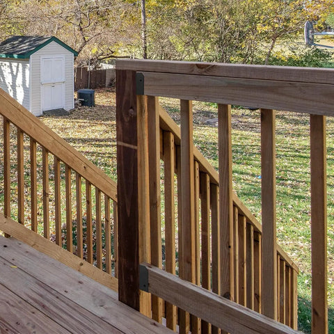 Outdoor wooden deck with 24 Pack 2x4 Deck Railing Brackets For Wood Posts - 18-Gauge Steel Black Powder Coated Fence Rail Connectors