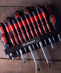 Everyday 18 Piece Screwdriver Set With Wall Mount And Magnetic Tips arranged in black rack on wooden surface