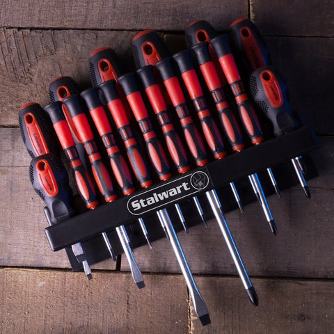 Everyday 18 Piece Screwdriver Set With Wall Mount And Magnetic Tips arranged in black rack on wooden surface