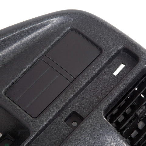Front view of black plastic dash panel bezel with instrument cluster trim and vent opening.