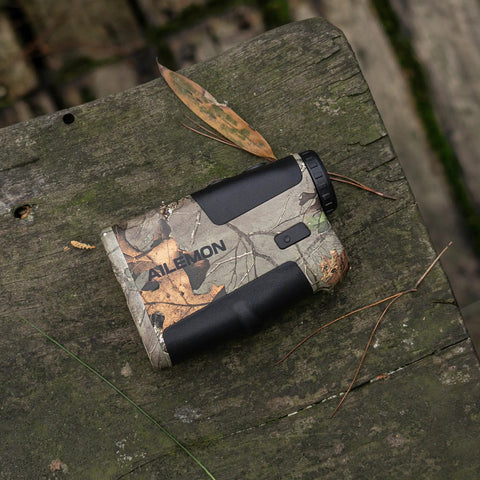 Waterproof Hunting Rangefinder With 5 To 900 Yards Range Fast Under 0.5 Seconds Readouts Camo Laser Distance Finder Angle And Scan Modes 6X Magnification Hunt Ready Archery Tool For Hunters on wood