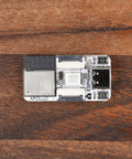 Plug And Play Smart Home Sensor Hub Delivered As A Straight Up Game Changer For Quick Home Assistant Setup With Zero Sweat Soldering Required And Dual Expansion Ports Linked To A Visual Device Builder For Smooth Local Control - top view of ESP32 module on wood surface.