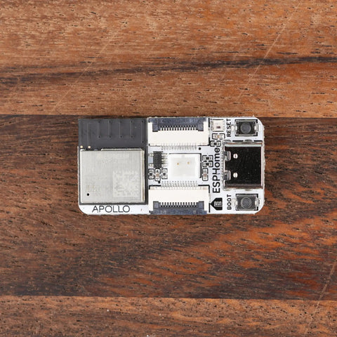 Plug And Play Smart Home Sensor Hub Delivered As A Straight Up Game Changer For Quick Home Assistant Setup With Zero Sweat Soldering Required And Dual Expansion Ports Linked To A Visual Device Builder For Smooth Local Control - top view of ESP32 module on wood surface.