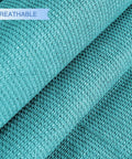 Close-up of turquoise 180GSM polyethylene material for Equilateral Triangle Sun Shade Sail 8 Ft by 8 Ft by 8 Ft For Patio Backyard Garden Outdoor Living UV Block Breathable Fade Resistant Canopy Shade Cover Turquoise