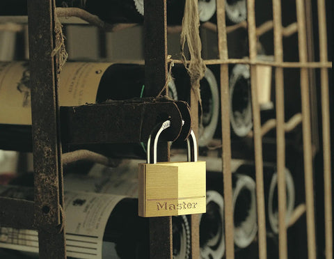 Solid Brass Padlock With Key 4 Pack For Indoor Outdoor Use Built To Last Heavy Duty Lock Set on wine rack