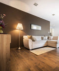 Modern living room with cozy lighting using 8W LED A19 Clear Filament Style Light Bulbs 3000K Soft White