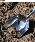Beefy Capacity Garden Scoop Stainless Steel Soil Shovel with beech handle digging in soil, ideal for home garden use.