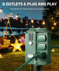 Outdoor Power Stake Timer With Six Grounded Outlets, Six Ft Extension Cord, 100 Ft Wireless Remote, in garden setting
