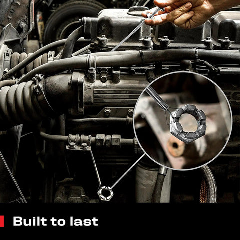 Using multipurpose pickup tool set with 36 inch flexible claw grabber for engine part retrieval in tight space.