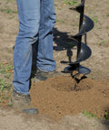 Person operating Earth Auger Combo With 52cc Two Cycle Powerhead And 8 Inch Auger Included Heavy Duty Handlebars
