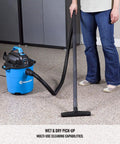 Person using Powerful 5 Gallon Wet Dry Shop Vacuum With 3 Peak HP Motor, includes 8 foot cord, on carpeted floor