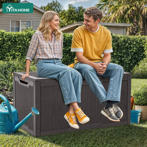 Two people sitting on 100 Gallon Large Deck Box Outdoor Resin Storage For Patio Furniture Cushions And Garden Tools Weatherproof Lockable Lid With Gas Strut Side Handles And Sturdy Bench Seating Up To 485 Pounds