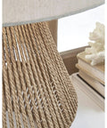 Close-up of Boho Coastal Table Lamp with 23.5 inch paper rope and wood base, light brown finish, natural rustic decor.