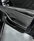 Autoclave Pressed Real Dry Carbon Fiber Door Panel Overlays Fits Tesla Model 3 Highland And Model Y Slick Matte 4 Piece Trim Kit close-up of installed door panel.