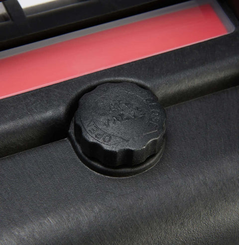 Kickass Hard Camera Case Featuring Smooth Side Handles And Custom Foam Dividers For Dslr Gear Transport air valve close-up image