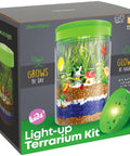 Light Up Terrarium Kit For Kids box with 4x6 in jar, LED lid, seeds, soil, rocks, and miniature garden scene for STEM learning.