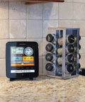 Iris Wireless Home Weather Station displayed on a kitchen counter with weather readings and lightning detection alert.