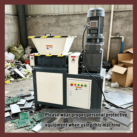 Beast 220V Universal Biaxial Metal Shredder Crusher Machine in recycling center with circuit boards