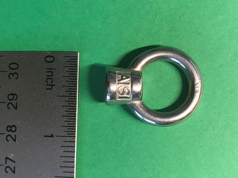 Four Pack Marine Grade Stainless Steel Lifting Eye Nuts One Quarter Inch UNC AISI 316 Corrosion Resistant Heavy Duty Eyebolts next to ruler