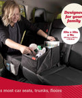 Woman arranging items in a Backseat Car Organizer With Built In Cup Holders And Mesh Pockets Foldable With Handles 9 Compartments