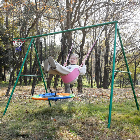 Child swinging on pink swing seat with heavy duty chains plastisol coated copolymer plastic for playground swing set