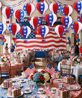 20 Pack July 4th Decor Set Red White Blue Hot Air Balloon Lanterns for Outdoor Patriotic Party hung over a decorated hall