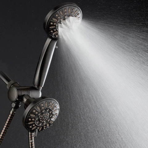 Oil Rubbed Bronze High Pressure Three Way Shower System With Rain Head And Six Setting Handheld in use, water spray visible