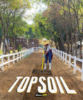 Person using Heavy Duty Lawn Leveling Rake With Seven Foot Handle 30 Inch By 10 Inch Steel Golf Rake for topsoil in yard.