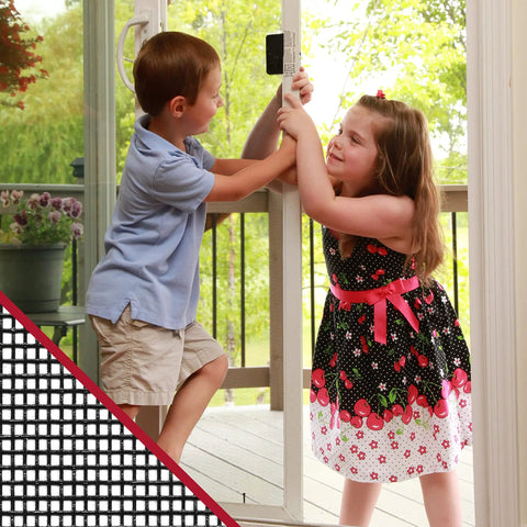 Two children playing by a screen door featuring the Extra Strength Window And Door Screen Roll 36 Inches By 100 Feet Charcoal Heavy Duty