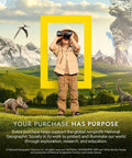 Person in explorer outfit with binoculars, surrounded by prehistoric landscape, dinosaurs, and National Geographic logo frame