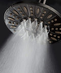 Oil Rubbed Bronze Rain Shower Head With Powerful High Pressure 7 Inch Diameter Six Settings spraying water downward.