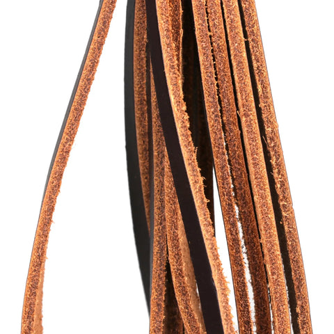 Close-up of the leather straps of a Leather Game Carrier Strap Belt With 12 Drop Slip Rings For Dove Duck Quail Pheasant And Other Small Game Bird Tote Hanger For Field Hunting Gear And More Today.