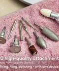 Top Shelf Portable Nail Drill Kit Electric File Machine With Ten Attachments And Ten Sanding Bands For Acrylic Gel Polish Home Manicure Pedicure LED light, 10 precision attachments on a pink towel.