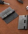 Six Pack 3 Inch Weld On Steel Butt Hinges Heavy Duty Rust Resistant Weldable Hinge Set on workbench