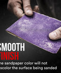 Pro Grade Purple Sandpaper 180 Grit No-Slip Grip For Wet Or Dry Use With Premium Cubitron II Mineral Grits, held in hands.