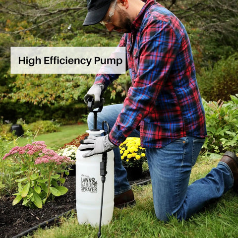 Person using Two Gallon Lawn And Garden Sprayer With 34 Inch Anti Kink Hose, Thumb Operated Control Valve With Lock in garden