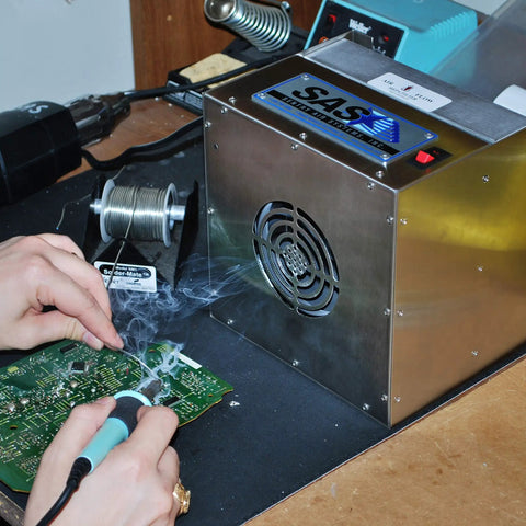 Portable Solder Smoke Fume Extractor for Soldering, Jewelry Making, and Crafting with ESD Safe Base in use on workbench