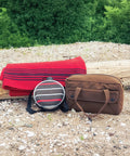2 Quart Striped Desert Canteen Water Bottle For Hiking And Camping BPA Free Reusable Outdoor Bottle beside red blanket