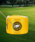 Golf Impact Bag for Swing Training, Durable Waterproof Hitting Bag on grass with a club hitting target area.