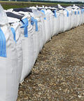Heavy Duty Builder Bulk Bags 200 Gallon White Woven Polypropylene Trash Bags For Demolition And Construction Jobs in a row
