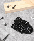 Two Pack Small Toggle Latches For Wooden Boxes And Guitar Cases, Chest Latch Replacement Hardware on wooden surface.