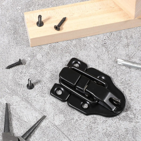 Two Pack Small Toggle Latches For Wooden Boxes And Guitar Cases, Chest Latch Replacement Hardware on wooden surface.