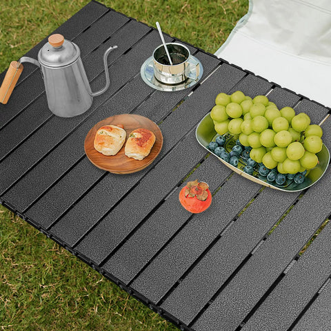 Folding Camping Table With Roll Up Top Height Adjustable Portable Metal Camp Table used for picnic with grapes and coffee set on top