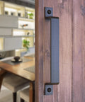 Installed 10 Inch Straight Bar Barn Door Handle In Matte Black Cast Iron Built To Last Tough As Nails Heavy Duty Pull For Sliding Doors Gates Sheds Fences Closets Indoor Outdoor Farmhouse Hardware on wood door