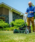 16 Inch 7 Blade Reel Lawn Mower With Grass Catcher For Bermuda Zoysia And Tiff Short Grass Types Eco Friendly Push Mower For Precise Neat Yard Care And Clean Cuts in use on a lawn