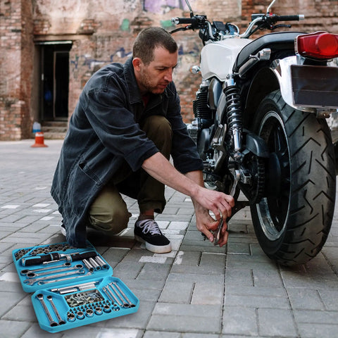 Mechanic working on motorcycle with 2-Piece Silicone Tool Tray Set, showing tools organized for sockets, nuts, bolts, and bits.