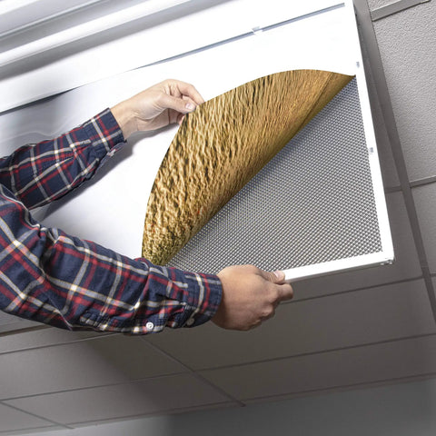 Person installing a 2x4 Fluorescent Light Covers For Classroom Ceiling Fixtures Beach Vibe 4 Pack, 22.38 Inches By 46.5 Inches